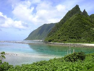 Featured is a photo of Ofu, Manu'a, one of the American Samoan Islands, taken from Olosega by Eric Guinther.